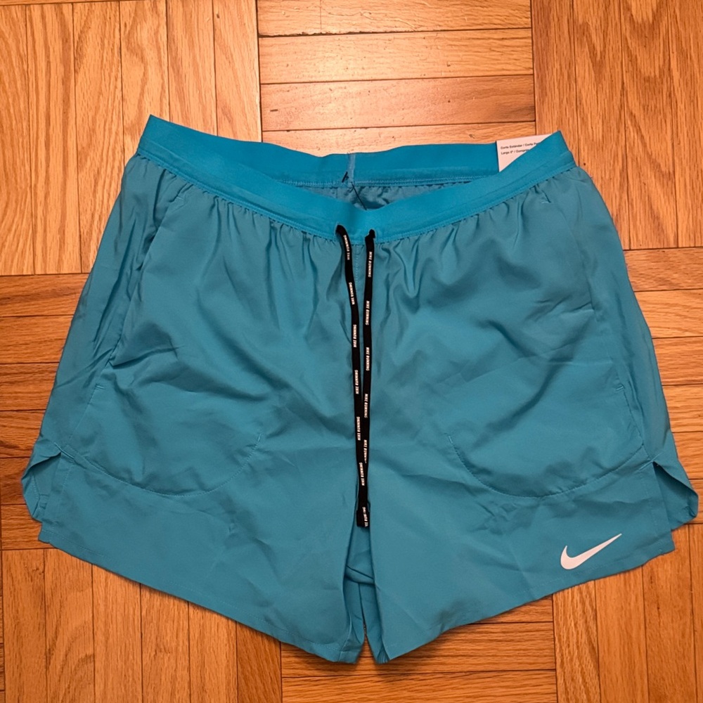 Nike Light Blue Running Shorts with Black Drawstring